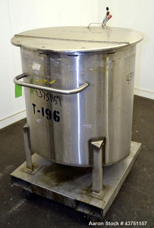 Used Water Cooling Corporation Tank, 100 Gallon, 304 Stainless Steel, Vertical. Approximately 31" diameter x 34" straight side.  Flat top with a bolt on hinged cover, 6" sloped bottom.  2" Tri-clamp ...