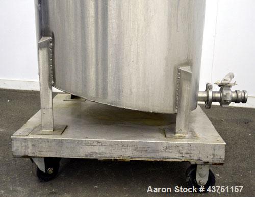 Used Water Cooling Corporation Tank, 100 Gallon, 304 Stainless Steel, Vertical. Approximately 31" diameter x 34" straight side.  Flat top with a bolt on hinged cover, 6" sloped bottom.  2" Tri-clamp ...