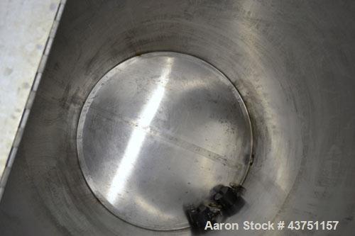 Used Water Cooling Corporation Tank, 100 Gallon, 304 Stainless Steel, Vertical. Approximately 31" diameter x 34" straight side.  Flat top with a bolt on hinged cover, 6" sloped bottom.  2" Tri-clamp ...