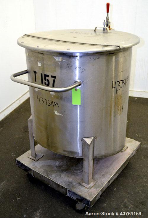 Used Water Cooling Corporation Tank, 100 Gallon, 304 Stainless Steel, Vertical. Approximately 31" diameter x 34" straight side.  Flat top with a bolt-on hinged cover, 6" sloped bottom.  2" Tri-clamp ...