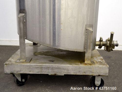 Used Water Cooling Corporation Tank, 100 Gallon, 304 Stainless Steel, Vertical. Approximately 31" diameter x 34" straight side.  Flat top with a bolt-on hinged cover, 6" sloped bottom.  2" Tri-clamp ...