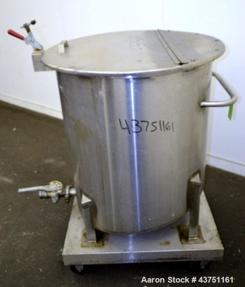 Used Water Cooling Corporation Tank, 100 Gallon, 304 Stainless Steel, Vertical. Approximately 31" diameter x 34" straight side.  Flat top with a bolt-on hinged cover, 6" sloped bottom.  2" Tri-clamp ...