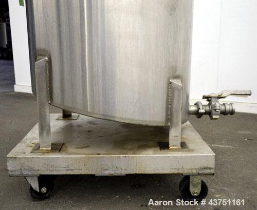 Used Water Cooling Corporation Tank, 100 Gallon, 304 Stainless Steel, Vertical. Approximately 31" diameter x 34" straight side.  Flat top with a bolt-on hinged cover, 6" sloped bottom.  2" Tri-clamp ...