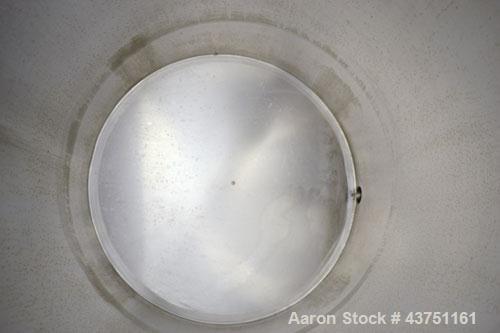 Used Water Cooling Corporation Tank, 100 Gallon, 304 Stainless Steel, Vertical. Approximately 31" diameter x 34" straight side.  Flat top with a bolt-on hinged cover, 6" sloped bottom.  2" Tri-clamp ...