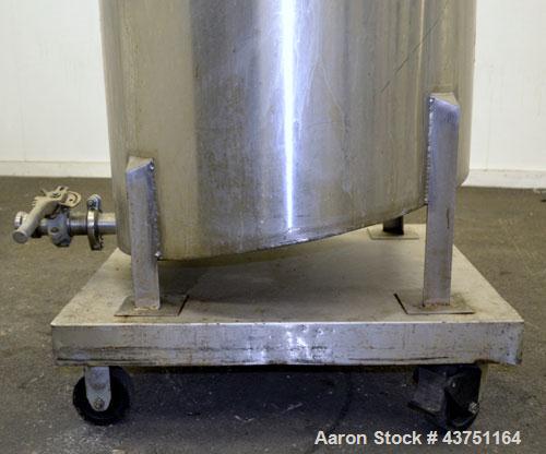 Used Water Cooling Corporation Tank, 100 Gallon, 304 Stainless Steel, Vertical. Approximately 31" diameter x 34" straight side.  Flat top with a bolt-on hinged cover, 6" sloped bottom.  2" Tri-clamp ...