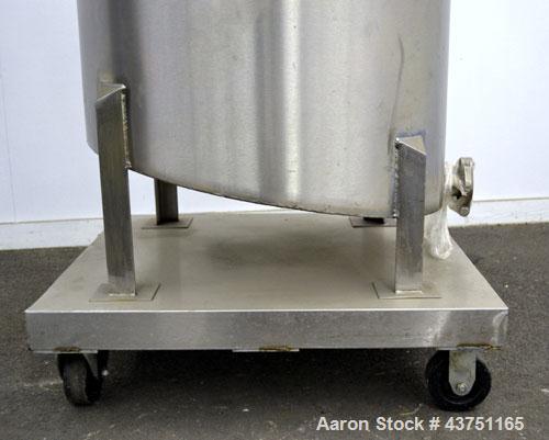 Used Water Cooling Corporation Tank, 100 Gallon, 304 Stainless Steel, Vertical. Approximately 31" diameter x 34" straight side.  Flat top with a bolt-on hinged cover, 6" sloped bottom.  2" Tri-clamp ...