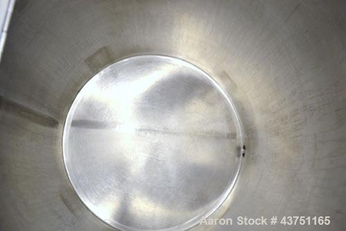 Used Water Cooling Corporation Tank, 100 Gallon, 304 Stainless Steel, Vertical. Approximately 31" diameter x 34" straight side.  Flat top with a bolt-on hinged cover, 6" sloped bottom.  2" Tri-clamp ...