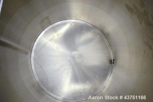 Used Water Cooling Corporation Tank, 100 Gallon, 304 Stainless Steel, Vertical. Approximately 31" diameter x 34" straight side.Flat top with a bolt-on hinged cover, 6" sloped bottom.2" Tri-clamp side...