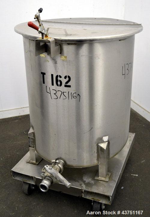 Used Water Cooling Corporation Tank, 100 Gallon, 304 Stainless Steel, Vertical. Approximately 31" diameter x 34" straight side.  Flat top with a bolt-on hinged cover, 6" sloped bottom.  2" Tri-clamp ...
