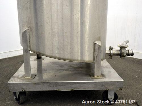 Used Water Cooling Corporation Tank, 100 Gallon, 304 Stainless Steel, Vertical. Approximately 31" diameter x 34" straight side.  Flat top with a bolt-on hinged cover, 6" sloped bottom.  2" Tri-clamp ...