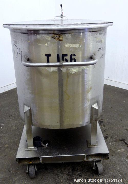 Used Water Cooling Corporation Tank, 100 Gallon, 304 Stainless Steel, Vertical. Approximately 31" diameter x 34" straight side.  Flat top with a bolt-on hinged cover, 6" sloped bottom.  2" Tri-clamp ...