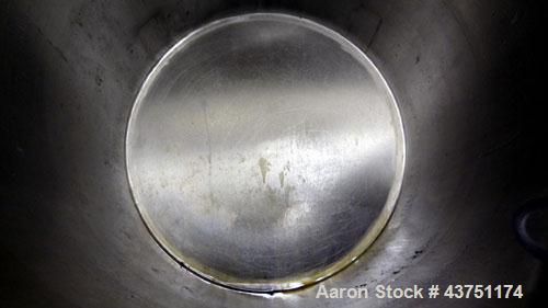Used Water Cooling Corporation Tank, 100 Gallon, 304 Stainless Steel, Vertical. Approximately 31" diameter x 34" straight side.  Flat top with a bolt-on hinged cover, 6" sloped bottom.  2" Tri-clamp ...