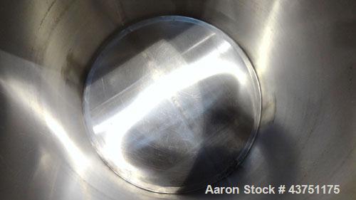 Used Water Cooling Corporation Tank, 100 Gallon, 304 Stainless Steel, Vertical. Approximately 31" diameter x 34" straight side.  Flat top with a bolt-on hinged cover, 6" sloped bottom.  2" Tri-clamp ...