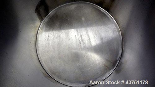 Used Water Cooling Corporation Tank, 100 Gallon, 304 Stainless Steel, Vertical. Approximately 31" diameter x 34" straight side.  Flat top with a bolt-on hinged cover, 6" sloped bottom.  2" Tri-clamp ...