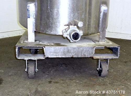 Used Water Cooling Corporation Tank, 100 Gallon, 304 Stainless Steel, Vertical. Approximately 31" diameter x 34" straight side.  Flat top with a bolt-on hinged cover, 6" sloped bottom.  2" Tri-clamp ...