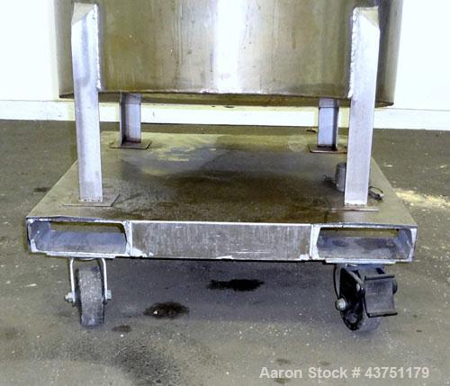 Used Water Cooling Corporation Tank, 100 Gallon, 304 Stainless Steel, Vertical. Approximately 31" diameter x 34" straight side.  Flat top with a bolt-on hinged cover, 6" sloped bottom.  2" Tri-clamp ...
