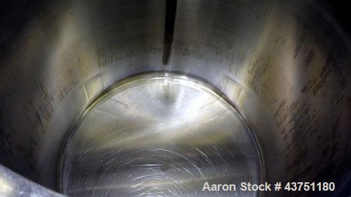 Used Water Cooling Corporation Tank, 100 Gallon, 304 Stainless Steel, Vertical. Approximately 31" diameter x 34" straight side.  Flat top with a bolt-on hinged cover, 6" sloped bottom.  2" Tri-clamp ...