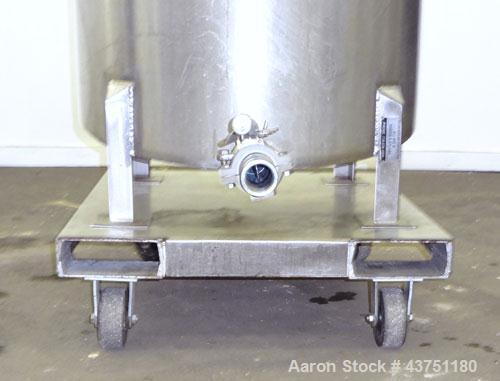 Used Water Cooling Corporation Tank, 100 Gallon, 304 Stainless Steel, Vertical. Approximately 31" diameter x 34" straight side.  Flat top with a bolt-on hinged cover, 6" sloped bottom.  2" Tri-clamp ...
