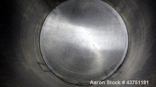 Used Water Cooling Corporation Tank, 100 Gallon, 304 Stainless Steel, Vertical. Approximately 31" diameter x 34" straight side.  Flat top with a bolt-on hinged cover, 6" sloped bottom.  2" Tri-clamp ...