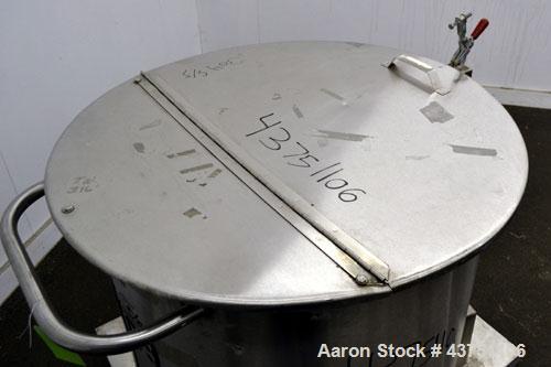 Used Water Cooling Corporation Tank, 60 Gallon, 304 Stainless Steel, Vertical. Approximately 30-1/2" diameter x 21" straight side.  Flat top with a bolt-on hinged cover, 6" sloped bottom.  2" Tri-cla...
