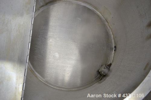 Used Water Cooling Corporation Tank, 60 Gallon, 304 Stainless Steel, Vertical. Approximately 30-1/2" diameter x 21" straight side.  Flat top with a bolt-on hinged cover, 6" sloped bottom.  2" Tri-cla...