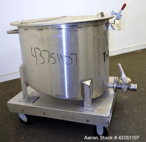 Used Water Cooling Corporation Tank, 60 Gallon, 304 Stainless Steel, Vertical. Approximately 30-1/2" diameter x 21" straight side.  Flat top with a bolt-on hinged cover, 6" sloped bottom.  2" Tri-cla...