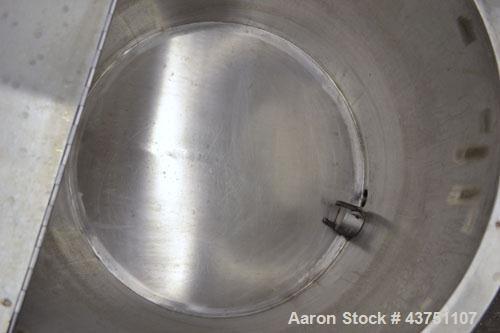 Used Water Cooling Corporation Tank, 60 Gallon, 304 Stainless Steel, Vertical. Approximately 30-1/2" diameter x 21" straight side.  Flat top with a bolt-on hinged cover, 6" sloped bottom.  2" Tri-cla...