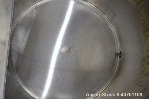 Used Water Cooling Corporation Tank, 60 Gallon, 304 Stainless Steel, Vertical. Approximately 30-1/2" diameter x 21" straight side.  Flat top with a bolt-on hinged cover, 6" sloped bottom.   2" Tri-cl...