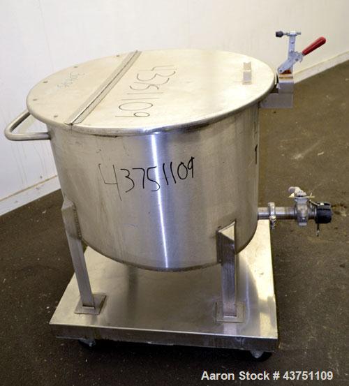 Used Water Cooling Corporation Tank, 60 Gallon, 304 Stainless Steel, Vertical. Approximately 30-1/2" diameter x 21" straight side. Flat top with a bolt-on hinged cover, 6" sloped bottom.  2" Tri-clam...