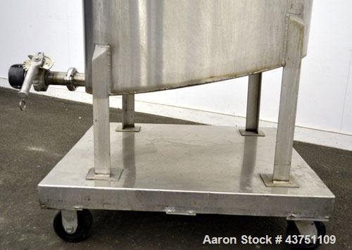 Used Water Cooling Corporation Tank, 60 Gallon, 304 Stainless Steel, Vertical. Approximately 30-1/2" diameter x 21" straight side. Flat top with a bolt-on hinged cover, 6" sloped bottom.  2" Tri-clam...