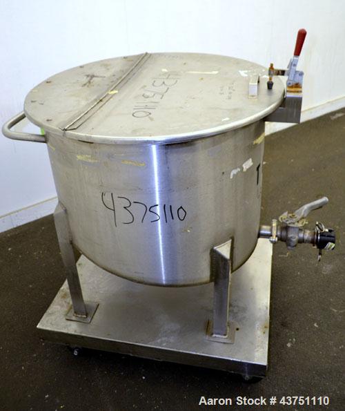 Used Water Cooling Corporation Tank, 60 Gallon, 304 Stainless Steel, Vertical. Approximately 30-1/2" diameter x 21" straight side.  Flat top with a bolt-on hinged cover, 6" sloped bottom.  2" Tri-cla...