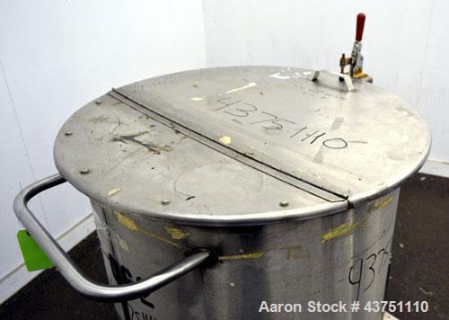 Used Water Cooling Corporation Tank, 60 Gallon, 304 Stainless Steel, Vertical. Approximately 30-1/2" diameter x 21" straight side.  Flat top with a bolt-on hinged cover, 6" sloped bottom.  2" Tri-cla...