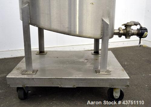 Used Water Cooling Corporation Tank, 60 Gallon, 304 Stainless Steel, Vertical. Approximately 30-1/2" diameter x 21" straight side.  Flat top with a bolt-on hinged cover, 6" sloped bottom.  2" Tri-cla...