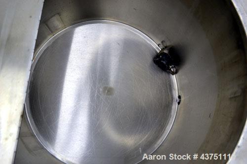 Used Water Cooling Corporation Tank, 60 Gallon, 304 Stainless Steel, Vertical. Approximately 30-1/2" diameter x 21" straight side.  Flat top with a bolt-on hinged cover, 6" sloped bottom.  2" Tri-cla...