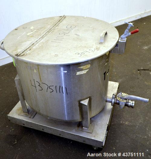 Used Water Cooling Corporation Tank, 60 Gallon, 304 Stainless Steel, Vertical. Approximately 30-1/2" diameter x 21" straight side.  Flat top with a bolt-on hinged cover, 6" sloped bottom.  2" Tri-cla...