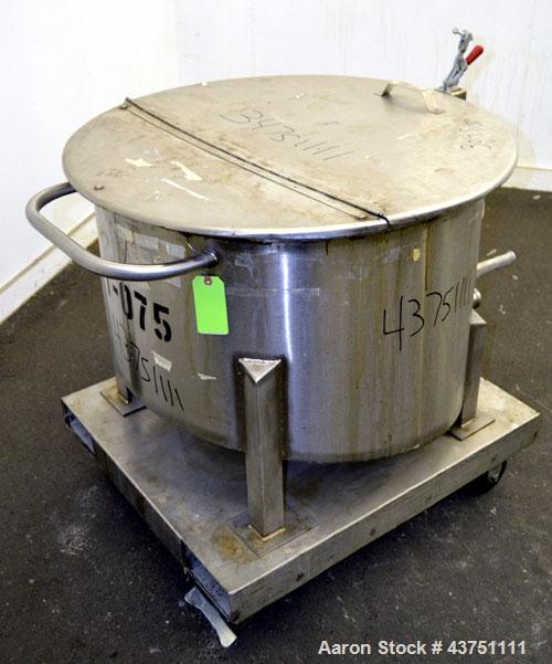 Used Water Cooling Corporation Tank, 60 Gallon, 304 Stainless Steel, Vertical. Approximately 30-1/2" diameter x 21" straight side.  Flat top with a bolt-on hinged cover, 6" sloped bottom.  2" Tri-cla...