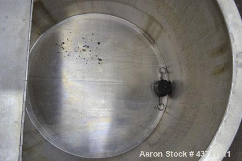 Used Water Cooling Corporation Tank, 60 Gallon, 304 Stainless Steel, Vertical. Approximately 30-1/2" diameter x 21" straight side.  Flat top with a bolt-on hinged cover, 6" sloped bottom.  2" Tri-cla...