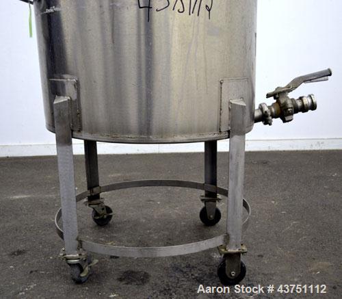 Used Water Cooling Corporation Tank, 60 Gallons, 304 Stainless Steel, Vertical. Approximately 30-1/2" diameter x 21" straight side.  Flat top with a bolt-on hinged cover, 1" sloped bottom.  2" Tri-cl...