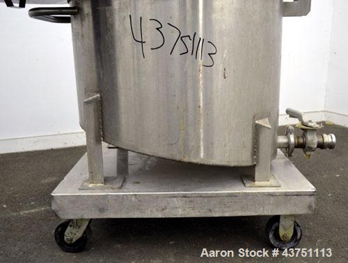 Used Water Cooling Corporation Tank, 60 Gallons, 304 Stainless Steel, Vertical. Approximately 30-1/2" diameter x 21" straight side.  Flat top with a bolt-on hinged cover, 6" sloped bottom.  2" Tri-cl...