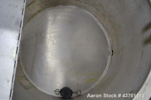 Used Water Cooling Corporation Tank, 60 Gallons, 304 Stainless Steel, Vertical. Approximately 30-1/2" diameter x 21" straight side.  Flat top with a bolt-on hinged cover, 6" sloped bottom.  2" Tri-cl...