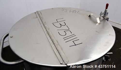 Used Water Cooling Corporation Tank, 60 Gallons, 304 Stainless Steel, Vertical. Approximately 30-1/2" diameter x 21" straight side.  Flat top with a bolt-on hinged cover, 6" sloped bottom.  2" Tri-cl...
