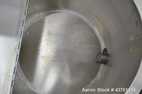 Used Water Cooling Corporation Tank, 60 Gallons, 304 Stainless Steel, Vertical. Approximately 30-1/2" diameter x 21" straight side.  Flat top with a bolt-on hinged cover, 6" sloped bottom.  2" Tri-cl...