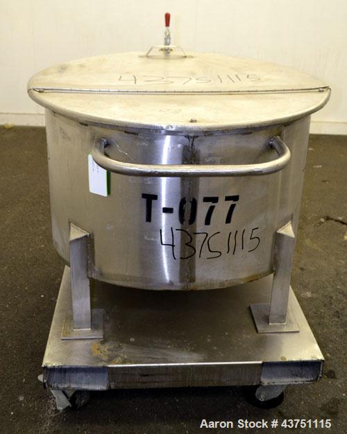 Used Water Cooling Corporation Tank, 60 Gallons, 304 Stainless Steel, Vertical. Approximately 30-1/2" diameter x 21" straight side.  Flat top with a bolt-on hinged cover, 6" sloped bottom.  2" Tri-cl...