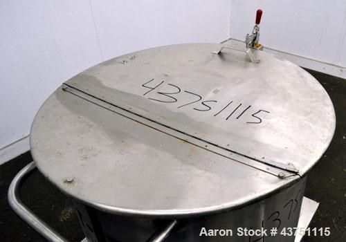 Used Water Cooling Corporation Tank, 60 Gallons, 304 Stainless Steel, Vertical. Approximately 30-1/2" diameter x 21" straight side.  Flat top with a bolt-on hinged cover, 6" sloped bottom.  2" Tri-cl...