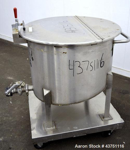 Used Water Cooling Corporation Tank, 60 Gallons, 304 Stainless Steel, Vertical. Approximately 30-1/2" diameter x 21" straight side.  Flat top with a bolt-on hinged cover, 6" sloped bottom.  2" Tri-cl...