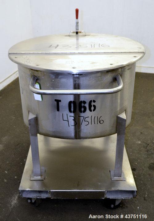 Used Water Cooling Corporation Tank, 60 Gallons, 304 Stainless Steel, Vertical. Approximately 30-1/2" diameter x 21" straight side.  Flat top with a bolt-on hinged cover, 6" sloped bottom.  2" Tri-cl...