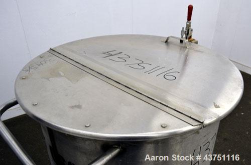 Used Water Cooling Corporation Tank, 60 Gallons, 304 Stainless Steel, Vertical. Approximately 30-1/2" diameter x 21" straight side.  Flat top with a bolt-on hinged cover, 6" sloped bottom.  2" Tri-cl...