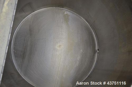 Used Water Cooling Corporation Tank, 60 Gallons, 304 Stainless Steel, Vertical. Approximately 30-1/2" diameter x 21" straight side.  Flat top with a bolt-on hinged cover, 6" sloped bottom.  2" Tri-cl...