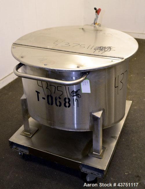 Used Water Cooling Corporation Tank, 60 Gallons, 304 Stainless Steel, Vertical. Approximately 30-1/2" diameter x 21" straight side.  Flat top with a bolt-on hinged cover, 6" sloped bottom.  2" Tri-cl...