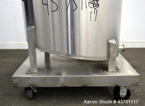 Used Water Cooling Corporation Tank, 60 Gallons, 304 Stainless Steel, Vertical. Approximately 30-1/2" diameter x 21" straight side.  Flat top with a bolt-on hinged cover, 6" sloped bottom.  2" Tri-cl...